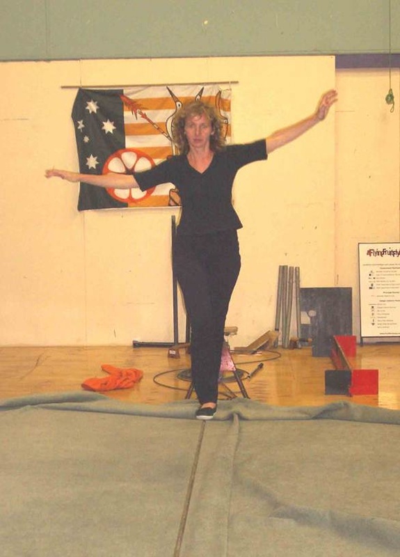 Picture of jeanni tight rope walking at the flying fruitfly circus school hour after she took her first session. A gam change for her and also the catalyst for her unique approach to teaching art.