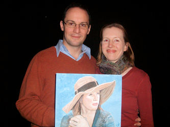 Picture of Michael with his painting of his wife after art lessons with jeanni