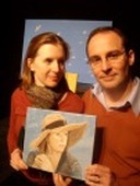 Picture of Michael with the portrait of his wife which he completed after his third art lesson with jeanni.