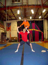 jeanni with her son James Blaxall ( Bustar Blaxall )Picture. It show jeanni and James at the Flying Fruit Fly Circus  School in Austrailia.