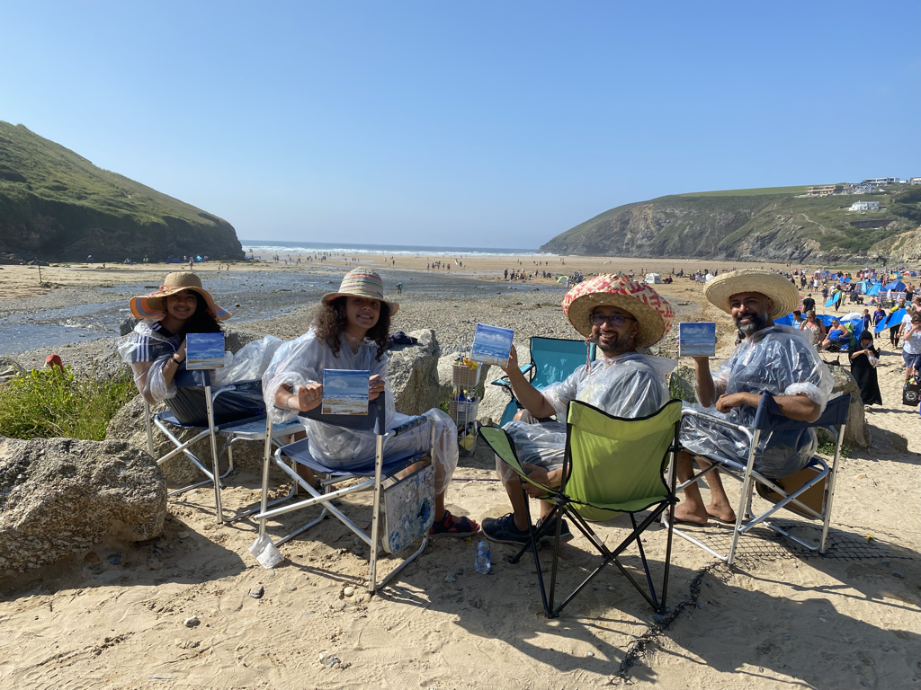 Picture of an artlesson for a group on Mawgan Porth Beach, Art at the Beach.