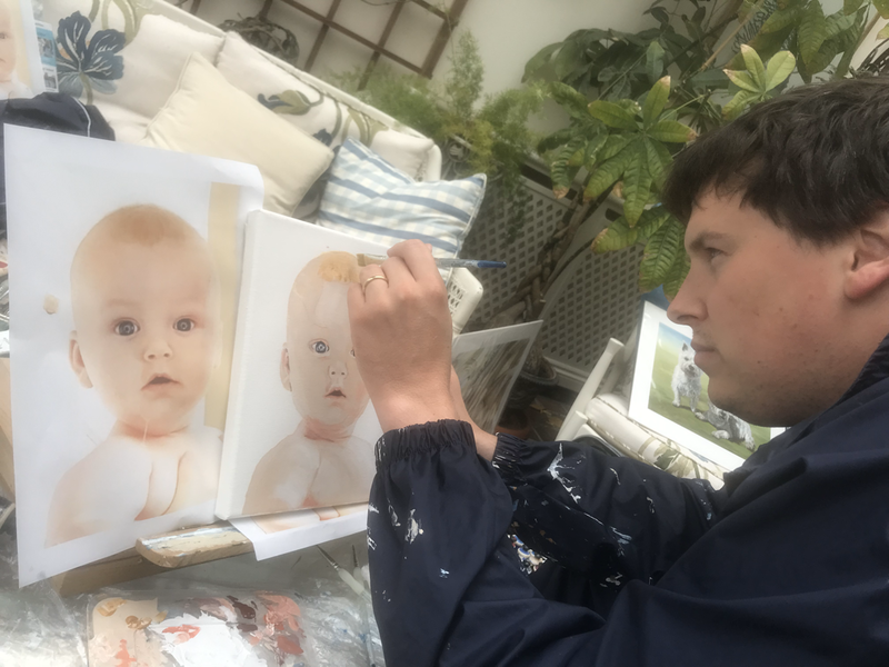 Gentleman at the Nare Hotel painting his baby with jeanni